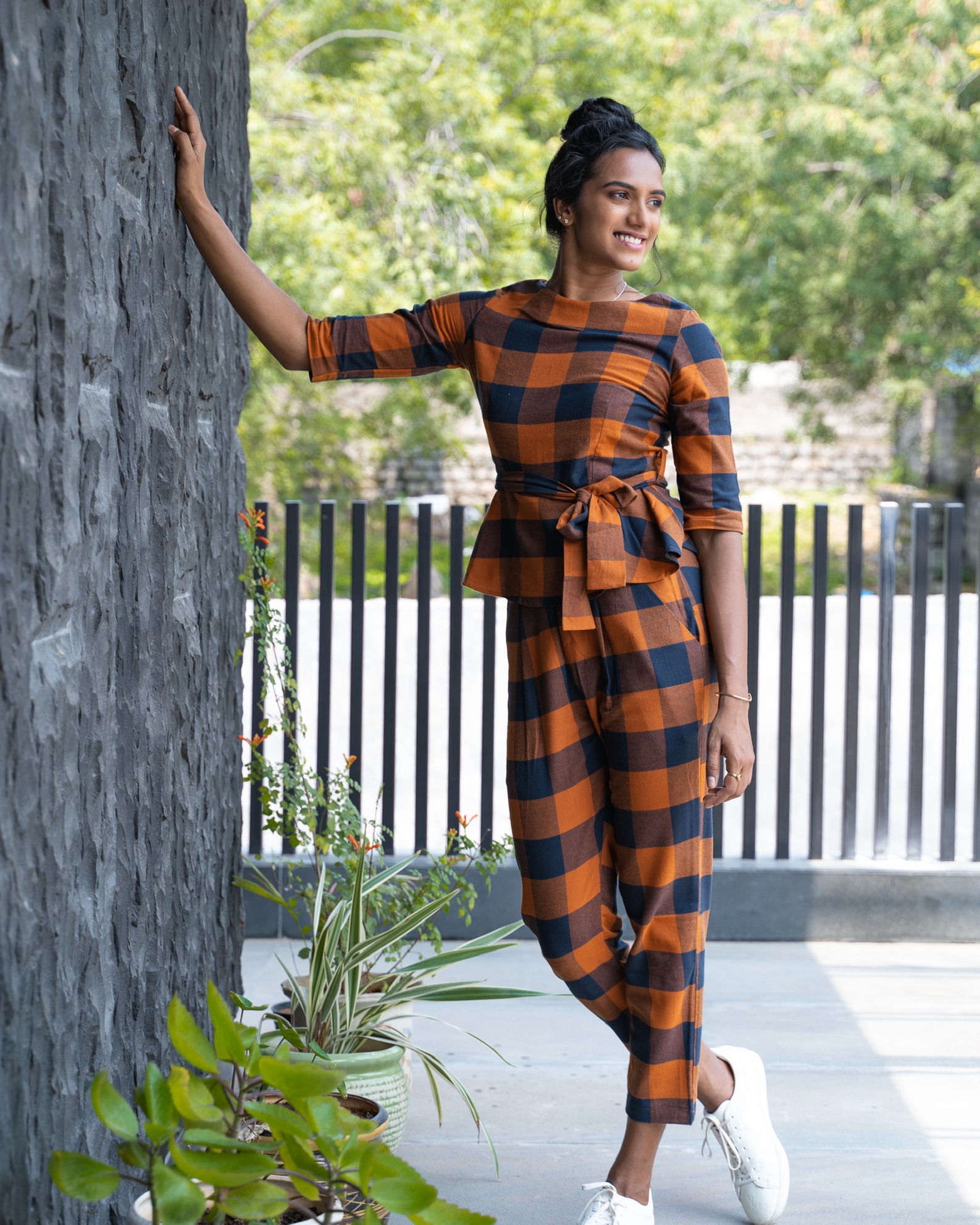 PV Sindhu in checked peplum top and trousers(Bornalii Caldeira)