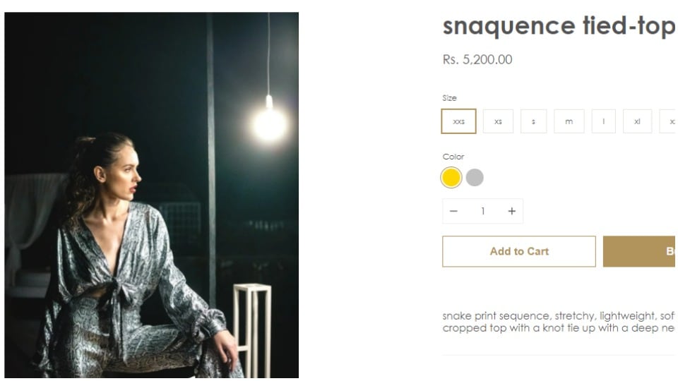 The snake-printed tie-up top donned by Krishna in the pictures, is priced at ₹5200 in the designer house Mishqa’s official website.(https://mishqastore.com/)