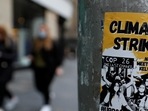 A poster highlighting climate crisis is seen on a post, as COP26 takes place in Glasgow.(HT_PRINT) A poster highlighting climate crisis is seen on a post, as COP26 takes place in Glasgow.(HT_PRINT)