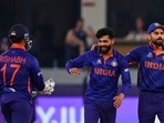 India's Ravindra Jadeja, center, celebrates with captain Virat Kohli, right, and Rishabh Pant India's Ravindra Jadeja, center, celebrates with captain Virat Kohli, right, and Rishabh Pant