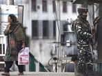 Security personnel stand guard at a checkpoint in Srinagar. (PTI) Security personnel stand guard at a checkpoint in Srinagar. (PTI)