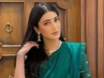 Shruti Haasan, in a <span class='webrupee'>₹</span>48K emerald green saree, is all about grace and elegance(Instagram/@shrutzhaasan) Shruti Haasan, in a <span class='webrupee'>₹</span>48K emerald green saree, is all about grace and elegance(Instagram/@shrutzhaasan)
