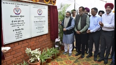 Cabinet Minister Bharat Bhushan Ashu laying the foundation stone of the model gaushala at GADVASU in Ludhiana on Wednesday. (Harsimar Pal Singh/HT)
