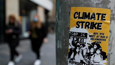 A poster highlighting climate crisis is seen on a post, asCOP26 takes place in Glasgow. (REUTERS) A poster highlighting climate crisis is seen on a post, asCOP26 takes place in Glasgow. (REUTERS)