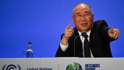 China's special climate envoy, Xie Zhenhua at a joint China and US statement on a declaration enhancing climate action in the 2020's during the COP26 climate change conference in Glasgow on November 10, 2021 (Photo by Jeff J Mitchell / various sources / AFP) China's special climate envoy, Xie Zhenhua at a joint China and US statement on a declaration enhancing climate action in the 2020's during the COP26 climate change conference in Glasgow on November 10, 2021 (Photo by Jeff J Mitchell / various sources / AFP)