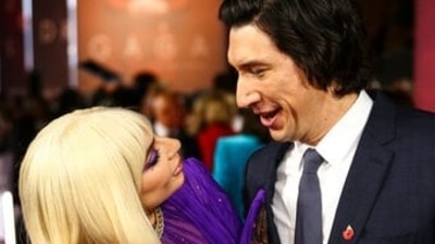 Adam Driver, right, and Lady Gaga pose for photographers. (Joel C Ryan/Invision/AP)