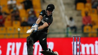 Cricket - ICC Men's T20 World Cup - Super 12 - Semi-Final - England v New Zealand - Sheikh Zayed Cricket Stadium, Abu Dhabi, United Arab Emirates - November 10, 2021 New Zealand's James Neesham hits a six REUTERS/Hamad I Mohammed (REUTERS)
