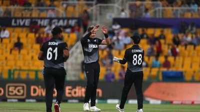 New Zealand's Tim Southee, centre, celebrates the dismissal of England's Dawid Malan during the Cricket Twenty20 World Cup semi-final match between England and New Zealand in Abu Dhabi, UAE, Wednesday, Nov. 10, 2021. (AP Photo/Aijaz Rahi) (AP) New Zealand's Tim Southee, centre, celebrates the dismissal of England's Dawid Malan during the Cricket Twenty20 World Cup semi-final match between England and New Zealand in Abu Dhabi, UAE, Wednesday, Nov. 10, 2021. (AP Photo/Aijaz Rahi) (AP)