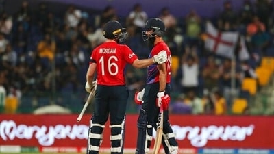 England's captain Eoin Morgan congratulates Moeen Ali bats on scoring 50 runs during the Cricket Twenty20 World Cup semi-final match between England and New Zealand in Abu Dhabi, UAE, Wednesday, Nov. 10, 2021. (AP Photo/Aijaz Rahi) (AP) England's captain Eoin Morgan congratulates Moeen Ali bats on scoring 50 runs during the Cricket Twenty20 World Cup semi-final match between England and New Zealand in Abu Dhabi, UAE, Wednesday, Nov. 10, 2021. (AP Photo/Aijaz Rahi) (AP)