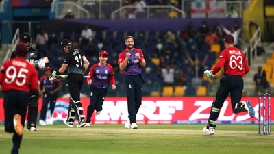England's Chris Woakes, without cap, celebrates the dismissal of New Zealand's Martin Guptill during the Cricket Twenty20 World Cup semi-final match between England and New Zealand in Abu Dhabi, UAE, Wednesday, Nov. 10, 2021. (AP Photo/Aijaz Rahi) (AP) England's Chris Woakes, without cap, celebrates the dismissal of New Zealand's Martin Guptill during the Cricket Twenty20 World Cup semi-final match between England and New Zealand in Abu Dhabi, UAE, Wednesday, Nov. 10, 2021. (AP Photo/Aijaz Rahi) (AP)