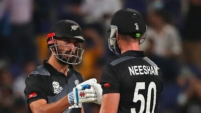 New Zealand's Daryl Mitchell and Jimmy Neesham celebrate scoring runs during the Cricket Twenty20 World Cup semi-final match between England and New Zealand in Abu Dhabi, UAE, Wednesday, Nov. 10, 2021. (AP Photo/Aijaz Rahi) (AP) New Zealand's Daryl Mitchell and Jimmy Neesham celebrate scoring runs during the Cricket Twenty20 World Cup semi-final match between England and New Zealand in Abu Dhabi, UAE, Wednesday, Nov. 10, 2021. (AP Photo/Aijaz Rahi) (AP)
