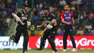 New Zealand's Daryl Mitchell, centre, and Mitchell Santner celebrate winning the Cricket Twenty20 World Cup semi-final match between England and New Zealand in Abu Dhabi, UAE, Wednesday, Nov. 10, 2021. (AP Photo/Aijaz Rahi) (AP) New Zealand's Daryl Mitchell, centre, and Mitchell Santner celebrate winning the Cricket Twenty20 World Cup semi-final match between England and New Zealand in Abu Dhabi, UAE, Wednesday, Nov. 10, 2021. (AP Photo/Aijaz Rahi) (AP)
