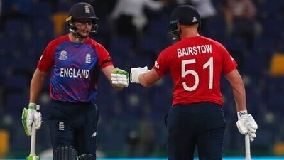 England's Jos Buttler, left, celebrates with batting partner Jonny Bairstow after hitting a four during the Cricket Twenty20 World Cup semi-final match between England and New Zealand in Abu Dhabi, UAE, Wednesday, Nov. 10, 2021. (AP Photo/Aijaz Rahi) (AP) England's Jos Buttler, left, celebrates with batting partner Jonny Bairstow after hitting a four during the Cricket Twenty20 World Cup semi-final match between England and New Zealand in Abu Dhabi, UAE, Wednesday, Nov. 10, 2021. (AP Photo/Aijaz Rahi) (AP)