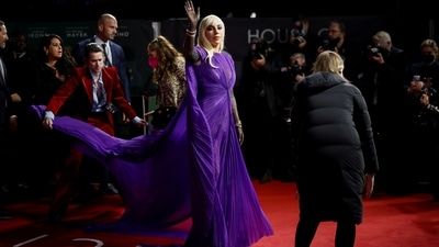 Lady Gaga waving at the fans and photographers. (REUTERS)