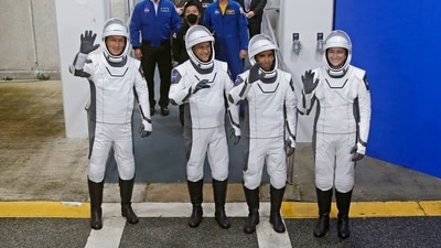 European Space Agency (ESA) astronaut Matthias Maurer of Germany, NASA astronauts Raja Chari, Tom Marshburn, and Kayla Barron wave while departing the crew quarters for launch aboard a SpaceX Falcon 9 rocket on a mission to the International Space Station at the Kennedy Space Center in Cape Canaveral, Florida, US.&nbsp; (Joe Skipper / REUTERS)