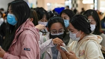 Officials in China have said they still consider squashing domestic flareups with aggressive curbs a better option for people’s safety. (AP) Officials in China have said they still consider squashing domestic flareups with aggressive curbs a better option for people’s safety. (AP)