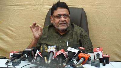 Maharashtra minister Nawab Malik addresses the media during a press conference in Mumbai on Tuesday. (HT photo) Maharashtra minister Nawab Malik addresses the media during a press conference in Mumbai on Tuesday. (HT photo)