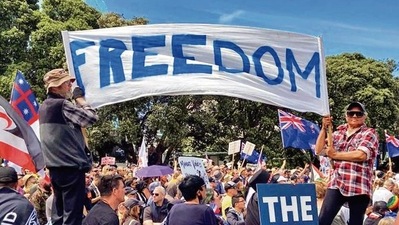 Protesters rally against coronavirus disease COVID-19 restrictions and vaccine mandates in Wellington. (Reuters) Protesters rally against coronavirus disease COVID-19 restrictions and vaccine mandates in Wellington. (Reuters)