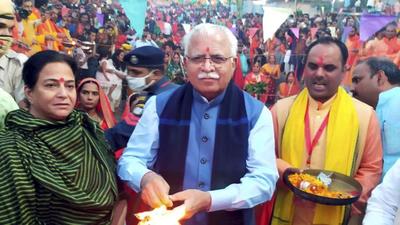 This is the first time that a chief minister, senior ministers and political leaders have participated in Chhath Puja events organised in the city. (PTI) This is the first time that a chief minister, senior ministers and political leaders have participated in Chhath Puja events organised in the city. (PTI)