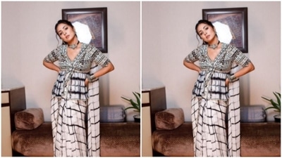 The georgette saree came with a zardosi embroidered peplum blouse fitted at the waist. (Instagram/@realhinakhan)