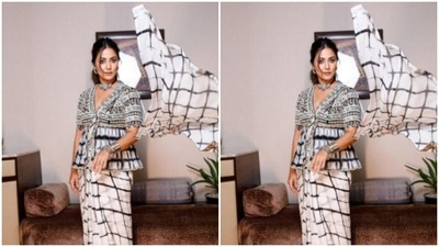 Styled by makeup artist Sachin Salvi, Hina opted for a minimal makeup look. In nude eyeshadow, mascara-laden eyelashes, drawn eyebrows, contoured cheeks and a nude shade of lipstick, Hina was ready to go. (Instagram/@realhinakhan)