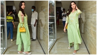 Nora chose a pretty green suit set for her outing in the bay today. She posed happily for the paparazzi and looked lovely in her simple yet chic ensemble for the day-out. The star has a flair for ethnic dressing, and this latest look is proof enough of the same. (HT Photo/Varinder Chawla) Nora chose a pretty green suit set for her outing in the bay today. She posed happily for the paparazzi and looked lovely in her simple yet chic ensemble for the day-out. The star has a flair for ethnic dressing, and this latest look is proof enough of the same. (HT Photo/Varinder Chawla)