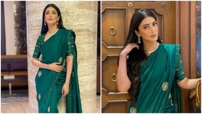 Shruti Haasan, in a ₹48K emerald green saree, is all about grace and elegance (Instagram/@shrutzhaasan) Shruti Haasan, in a ₹48K emerald green saree, is all about grace and elegance (Instagram/@shrutzhaasan)