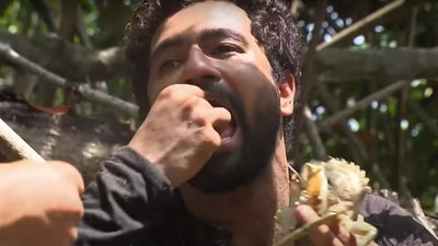 Bear Grylls fed Vicky Kaushal a crab picked up right from the swampy waters under their feet. Bear Grylls fed Vicky Kaushal a crab picked up right from the swampy waters under their feet.