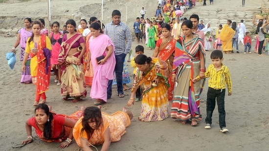 Chhath Puja Day 3: Devotees perform rituals as they head to Brahmaputra river Ghat to celebrate Chhath Puja in Tezpur. (Samir Kar/ANI Photo)