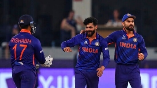 India's Ravindra Jadeja, center, celebrates with captain Virat Kohli, right, and Rishabh Pant (AP)
