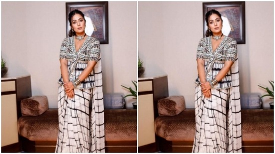 Hina played muse to fashion designer Reeti Arneja and dressed up in a black and white tie and dye saree from her wardrobe.(Instagram/@realhinakhan)
