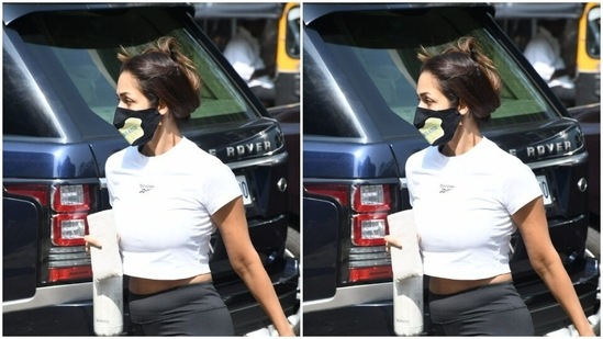 In monochrome, Malaika Arora slays Wednesday athleisure objectives 3 For Wednesday, Malaika chose a white cropped top to hit the yoga studio.(HT Photos/Varinder Chawla)
