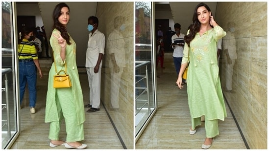 Nora chose a pretty green suit set for her outing in the bay today. She posed happily for the paparazzi and looked lovely in her simple yet chic ensemble for the day-out. The star has a flair for ethnic dressing, and this latest look is proof enough of the same.(HT Photo/Varinder Chawla)