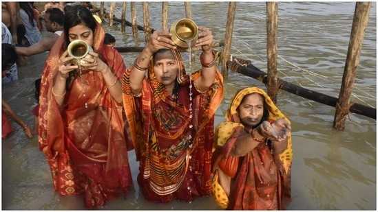 Women devotees took bath in the Ganges during Chhath Puja celebrations.(PTI)