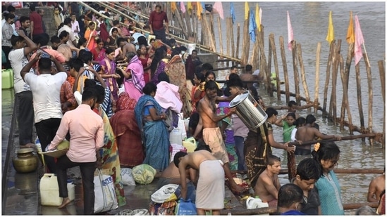 Devotees were seen taking a bath during Chhath Puja celebrations.(PTI)