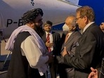 Taliban's acting foreign minister Amir Khan Muttaqi (left) is received by Pakistan's commerce advisor Abdul Razak Dawood (wearing mask), upon his arrival in Islamabad on Wednesday.(AFP Photo) Taliban's acting foreign minister Amir Khan Muttaqi (left) is received by Pakistan's commerce advisor Abdul Razak Dawood (wearing mask), upon his arrival in Islamabad on Wednesday.(AFP Photo)