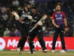 New Zealand's Daryl Mitchell and Mitchell Santner celebrate after winning the first semi-final of ICC Men's T20 World Cup match between England and New Zealand, at Sheikh Zayed stadium in Abu Dhabi on Wednesday.(ANI) New Zealand's Daryl Mitchell and Mitchell Santner celebrate after winning the first semi-final of ICC Men's T20 World Cup match between England and New Zealand, at Sheikh Zayed stadium in Abu Dhabi on Wednesday.(ANI)