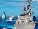 Warships sail in formation during the four-nation (India, US, Japan and Australia) Malabar 2021 exercise on August 27, 2021, promoting a free and open Indo-Pacific in a message to China.(AP) Warships sail in formation during the four-nation (India, US, Japan and Australia) Malabar 2021 exercise on August 27, 2021, promoting a free and open Indo-Pacific in a message to China.(AP)