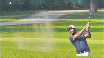 S Chikkarangappa in action during the Jeev Milkha Singh Invitational 2021 at the Chandigarh Golf Club on Thursday. Shiv Kapur and Abhijit Chadha got off to flying starts with brilliant rounds of eight-under 64 to share the first-round lead at the event. (Keshav Singh/ HT) S Chikkarangappa in action during the Jeev Milkha Singh Invitational 2021 at the Chandigarh Golf Club on Thursday. Shiv Kapur and Abhijit Chadha got off to flying starts with brilliant rounds of eight-under 64 to share the first-round lead at the event. (Keshav Singh/ HT)