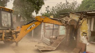 HSVP officials said that 10 permanent shops, vends and temporary hutments constructed on the land were removed by the enforcement team with the help of Gurugram police. (Sourced) HSVP officials said that 10 permanent shops, vends and temporary hutments constructed on the land were removed by the enforcement team with the help of Gurugram police. (Sourced)