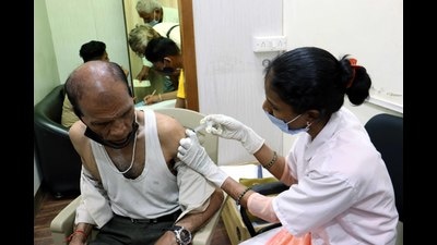 A resident gets his vaccination against Covid in Kalyan on Thursday. (RISHIKESH CHOUDHARY/HT PHOTO) A resident gets his vaccination against Covid in Kalyan on Thursday. (RISHIKESH CHOUDHARY/HT PHOTO)