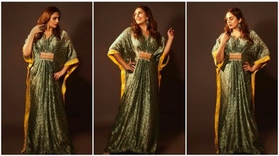 Kaftans were originated in Irag but is now worn by many West and Southwest Asian ethnic groups and has made it into several big fashion shows. Huma Qureshi, who keeps treating her fans with gorgeous pictures of herself in stylish outfits, took to her Instagram handle to share a few stills of herself in metallic green and yellow Kaftan. (Instagram/@iamhumaq) Kaftans were originated in Irag but is now worn by many West and Southwest Asian ethnic groups and has made it into several big fashion shows. Huma Qureshi, who keeps treating her fans with gorgeous pictures of herself in stylish outfits, took to her Instagram handle to share a few stills of herself in metallic green and yellow Kaftan. (Instagram/@iamhumaq)