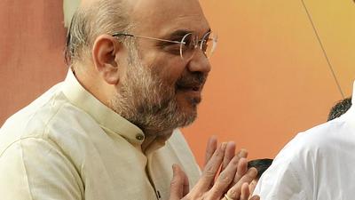 Home minister Amit Shah greets as he arrives to attend the Bharatiya Janata Party (BJP) National Executive meeting in New Delhi last Sunday. He will visit Varanasi in Uttar Pradesh on Friday. (ANI)