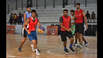 Players during a match of the Punjab Open 3x3 Basketball Championship at Guru Nanak Stadium in Ludhiana on Thursday. (Harsimar Pal Singh/HT)
