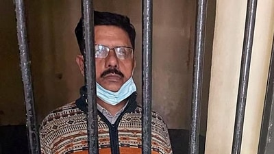 Bapu Bhavan section In-charge, Ichha Ram Yadav, arrested for allegedly molesting a woman contract worker, in Lucknow on Thursday. (ANI Photo) Bapu Bhavan section In-charge, Ichha Ram Yadav, arrested for allegedly molesting a woman contract worker, in Lucknow on Thursday. (ANI Photo)
