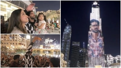 Dulquer Salmaan watches Kurup trailer on Burj Khalifa with family. Dulquer Salmaan watches Kurup trailer on Burj Khalifa with family.