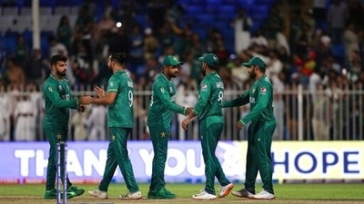Pakistan players greet each other after their win in the Cricket Twenty20 World Cup match against Scotland in Sharjah, UAE, Sunday, Nov. 7, 2021. (AP) Pakistan players greet each other after their win in the Cricket Twenty20 World Cup match against Scotland in Sharjah, UAE, Sunday, Nov. 7, 2021. (AP)