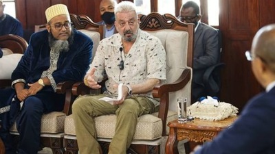 Sanjay Dutt wore a light brown T-shirt with yellow pants and white shoes to complete the semi-casual look. (Instagram/Dr Hussein Ali Mwinyi) 