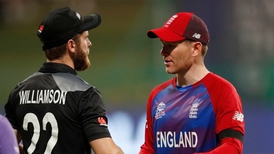 Semi-Final - England v New Zealand - Sheikh Zayed Cricket Stadium, Abu Dhabi, United Arab Emirates - November 10, 2021 New Zealand captain Kane Williamson shakes hands with England captain Eoin Morgan after the match (REUTERS)