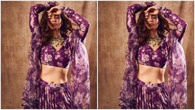Aamna played muse to the designer house Drzya by Riddhiiee Suuri and decked up in a dark violet floral printed lehenga. (Instagram/@aamnasharifofficial) Aamna played muse to the designer house Drzya by Riddhiiee Suuri and decked up in a dark violet floral printed lehenga. (Instagram/@aamnasharifofficial)